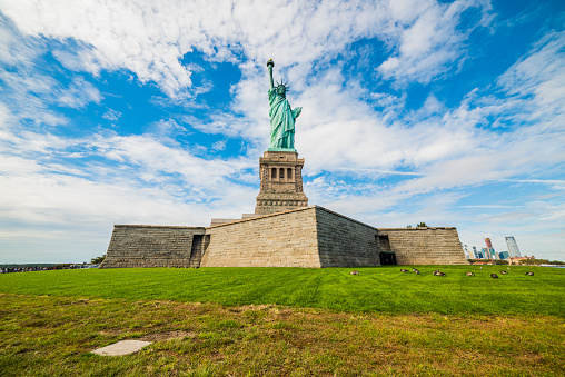 Statue of Liberty National Monument with blue sky background. New York, USA.
