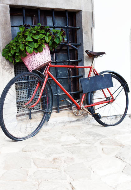istock rustic bicycle with basket full of mint leaves and blackboard suspended from saddle 1065949026