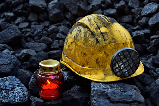 istock Vigil light, candle on cheap of coal 1065950846