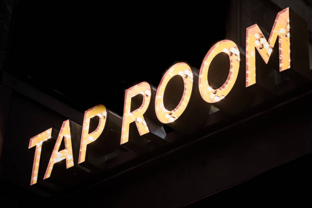 istock Tap Room illuminated yellow sign 1065952554