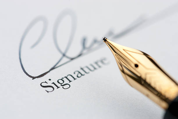istock Gold pen with signature 106596082