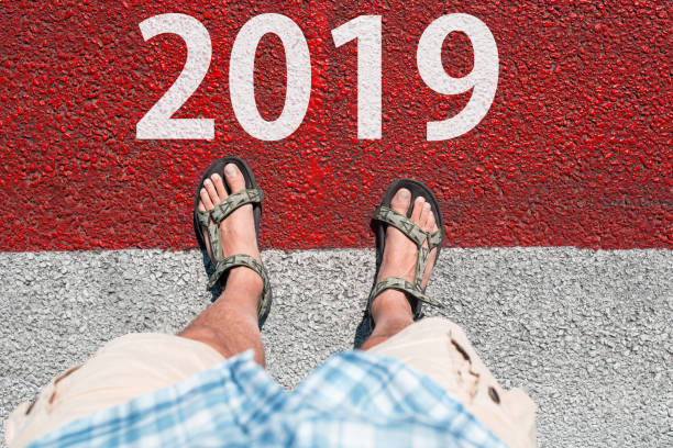 istock legs standing on the ground, top view 1065964588