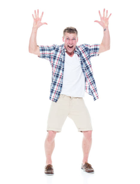 istock Handsome man in shirt and shorts is excited 1065976418