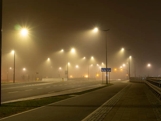 istock Foggy night lights in our city 1065982310
