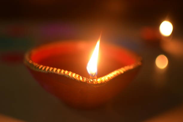 istock Isolated Hand Painted Diwali Diya 1065984956