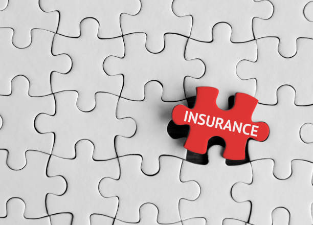 Insurance, Puzzle concept. Puzzle pieces with word 'Insurance’ car insurance photos stock pictures, royalty-free photos & images