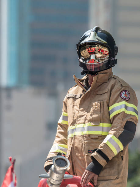 Portrait Firefighter Bombeiro fire retardant coverall stock photo