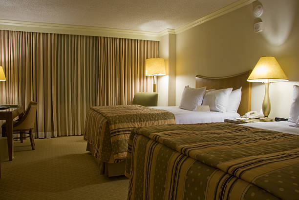 istock Two beds bedroom with three lamps 106599485