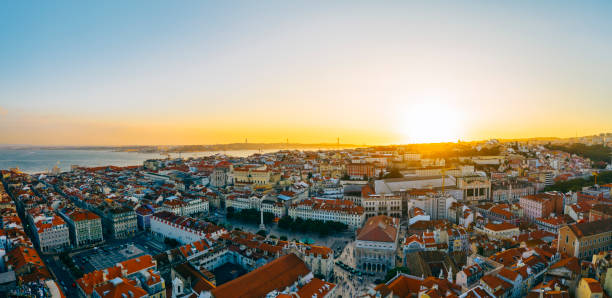 Aerial cityscape panorama Lisbon Portugal sunset Aerial cityscape panorama Lisbon Portugal sunset baixa stock pictures, royalty-free photos & images
