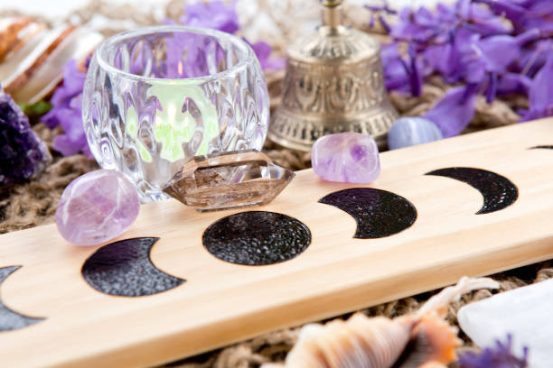 istock Witch Pagan Moon Phases Altar with crystal and flowers 1066016418
