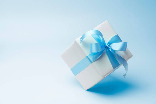 istock Simply white background with blue ribbon 1066023846