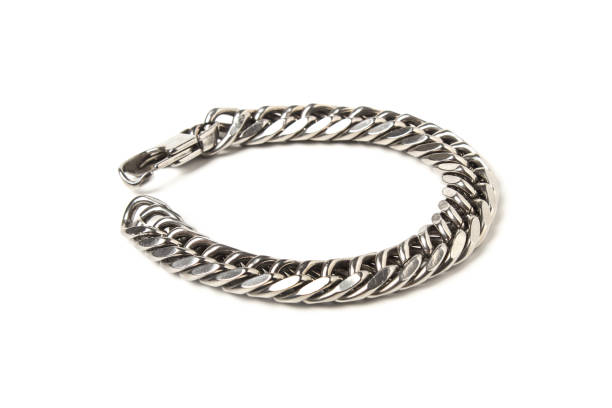 metallic men's bracelet - close up shiny merchandise rough imagens e fotografias de stock