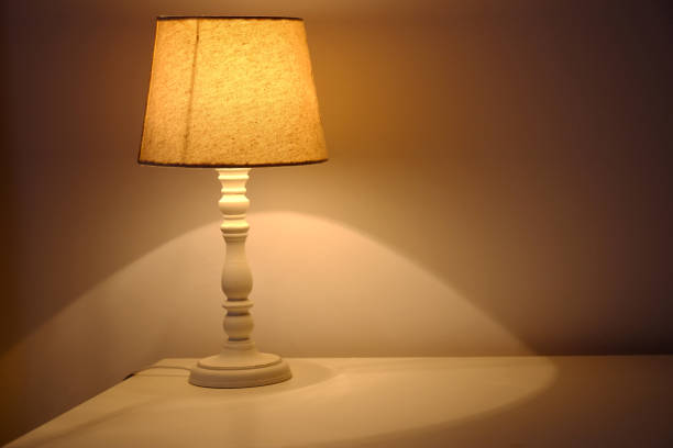 istock Old style lamp on the table at the bedroom 1066067128