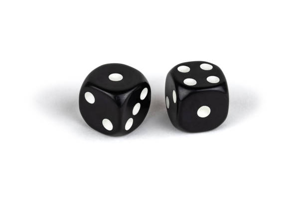 istock Two black dice isolated on a white background. One and four. 1066074312