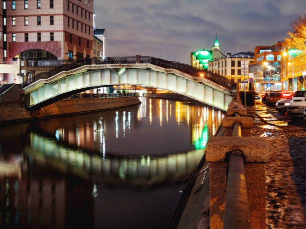 istock Gateway pedestrian bridge over Moscow-river. Night view on bridge between Kosmodamianskaya and Shluzovaya embankment. Moscow, Russia. 1066077394