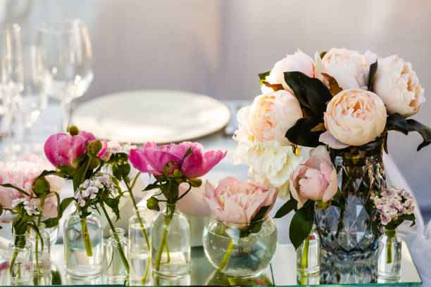 istock Festive table decor with white and pink flowers 1066086848