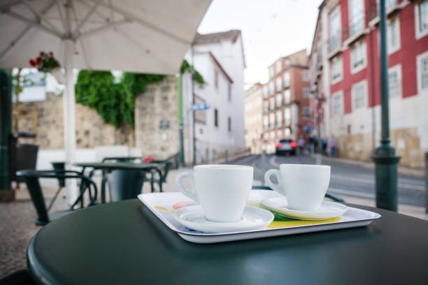 istock Cup of coffee on the street cafe table 1066090770