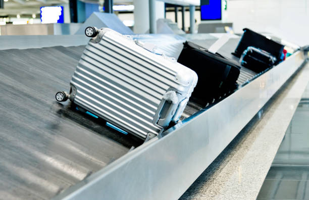 istock Suitcases on conveyor belt in the airport 1066092092