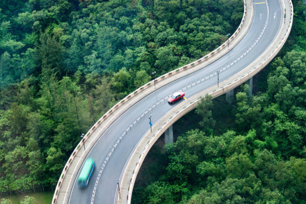 istock Aerial view of car driving on viaduct 1066096148