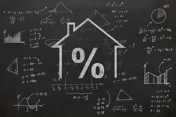 percentuale di mutui ipotecari per mutui immobiliari - house calculator real estate examining foto e immagini stock