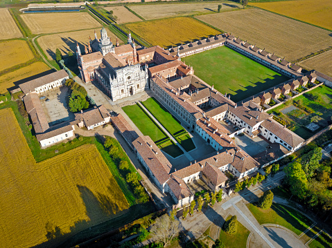 Aerial view of Certosa di Pavia, a monastery and complex in Lombardy, northern Italy. It is one of the largest monasteries in Italy.