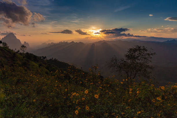 istock Phou Khoun Dramatic sky. sun ray shining over mountain. View point on laos luang prabang sky road. 1066121486
