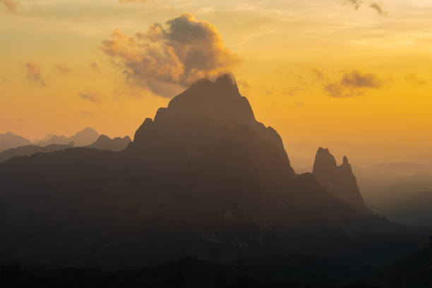istock Phou Khoun Dramatic sky. sun ray shining over mountain. View point on laos luang prabang sky road. 1066121500
