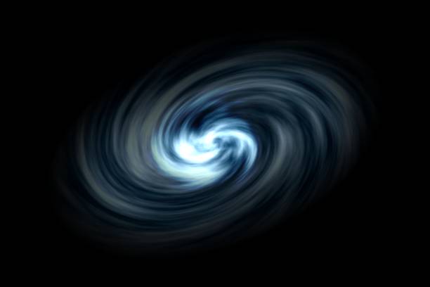 istock Abstract spiral galaxy with light blue smoke on black background 1066126946