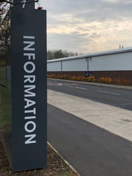 istock Construction steel warehouse and general information sign 1066128448