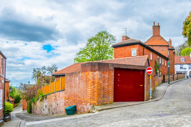istock an alley passing cathedral in Lincoln, England 1066129018