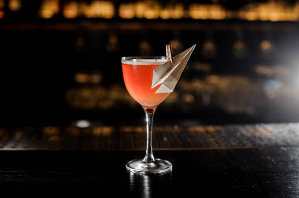 istock Decorated glass filled with fresh Paper Plane cocktail 1066136316