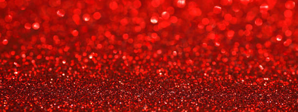 istock Red bokeh holiday textured glitter background 1066141608