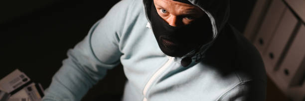 istock Man carder in mask connect to darknet 1066150586