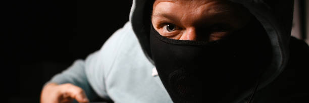 istock Man carder in mask connect to darknet 1066150608