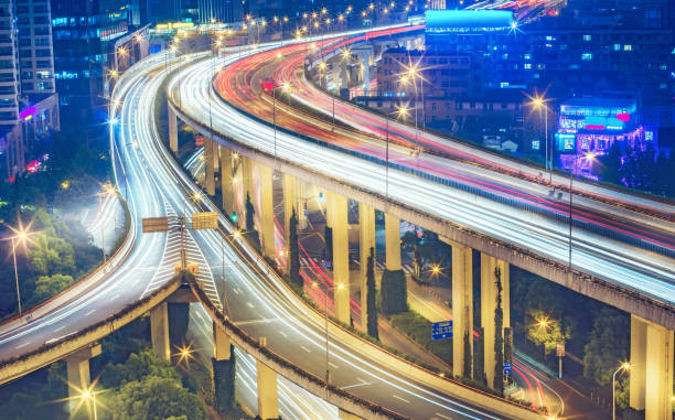 istock Scenic view on famous highway interchange in Shanghai, China at night. 1066154920