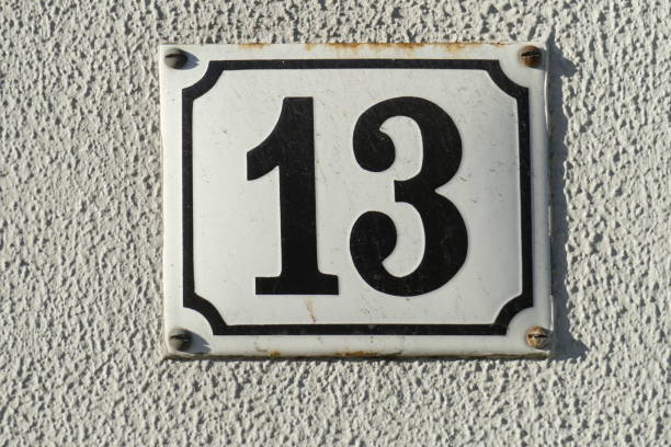 istock House number plate No. Thirteen 1066155314