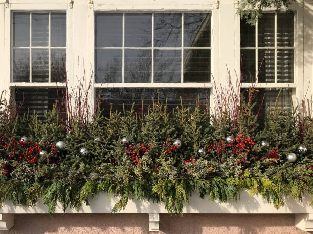 istock Christmas window boxes outdoor decor 1066156596