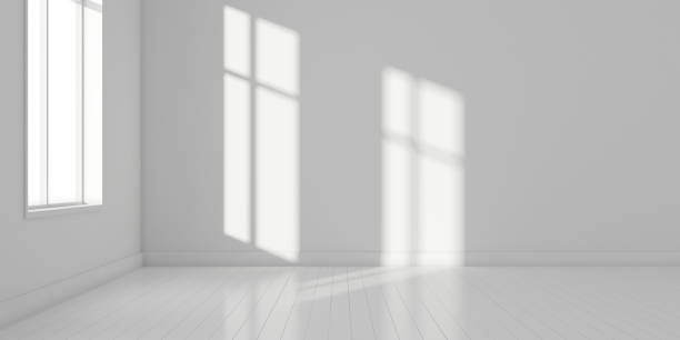 istock Stimulate image of white empty room interior and laminate wood floor with sun light cast shadow on the wall,Perspective of minimal design architecture. 3D rendering 1066157648