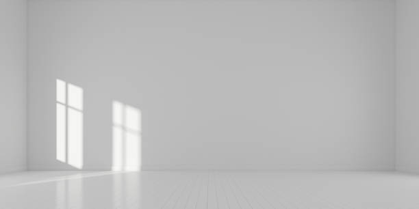 istock Stimulate image of white empty room interior and laminate wood floor with sun light cast shadow on the wall,Perspective of minimal design architecture. 3D rendering 1066157660