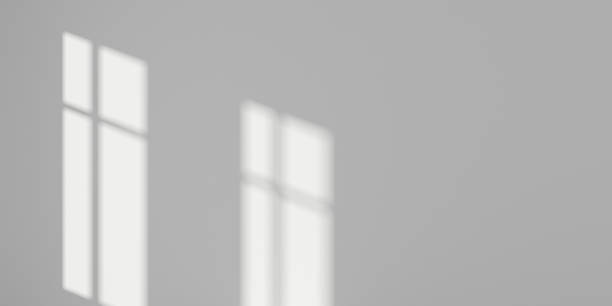 istock Stimulate image of white empty room interior and laminate wood floor with sun light cast shadow on the wall,Perspective of minimal design architecture. 3D rendering 1066157666