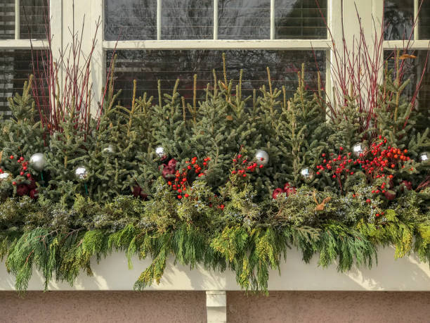 istock Christmas window boxes outdoor decor 1066157726
