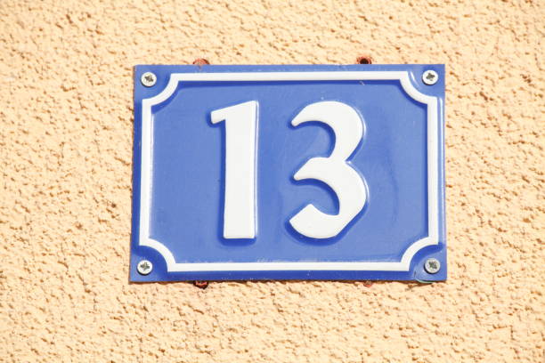 istock House number plate No. Thirteen 1066158184