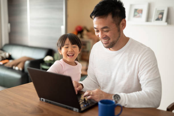 istock Father working from home with daughter 1066159854