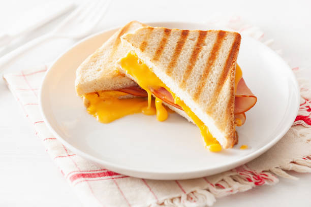 grilled ham and cheese sandwich grilled ham and cheese sandwich ham and cheese sandwich stock pictures, royalty-free photos & images