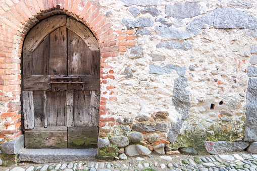 Front shot, with original textures and materials. Photo taken in a medieval village in Italy.