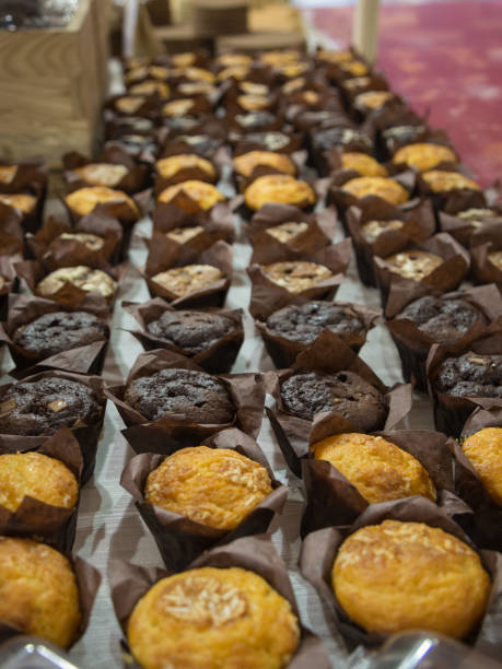 istock Several Types of Muffins Pastries arranged in Linear order on a Table 1066169902