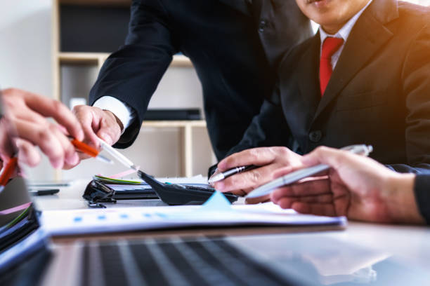istock Business man people co-working for analyzing financial data investment in office.Teamwork successful meeting workplace strategy concept. 1066171998