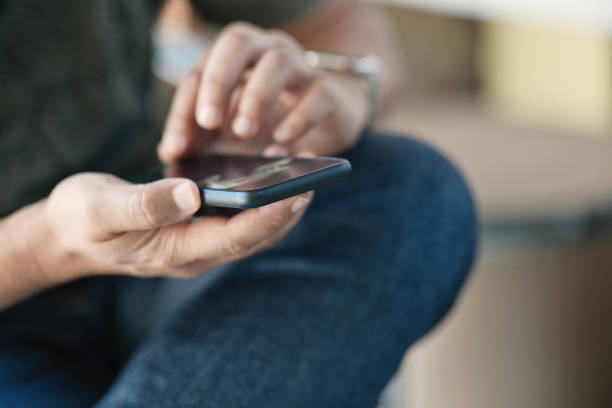 istock Closes-up man hand holding mobile smartphone. 1066174030