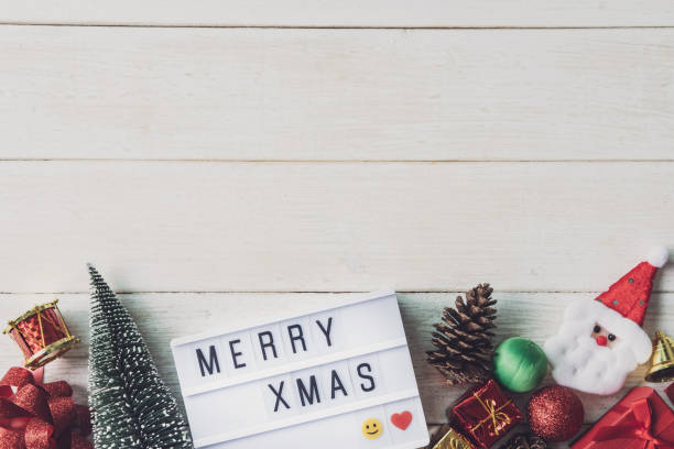 istock Christmas decoration on white wooden background with copy space 1066181902