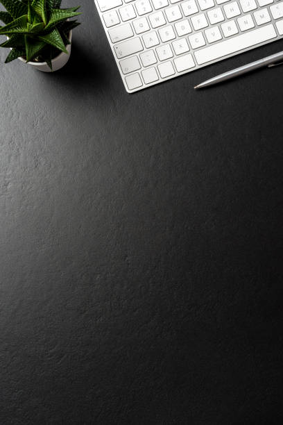 istock Business accessories on dark background with copy space 1066182322